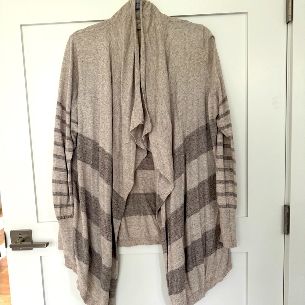 Barely worn stylish cardigan sweater in neutral colors